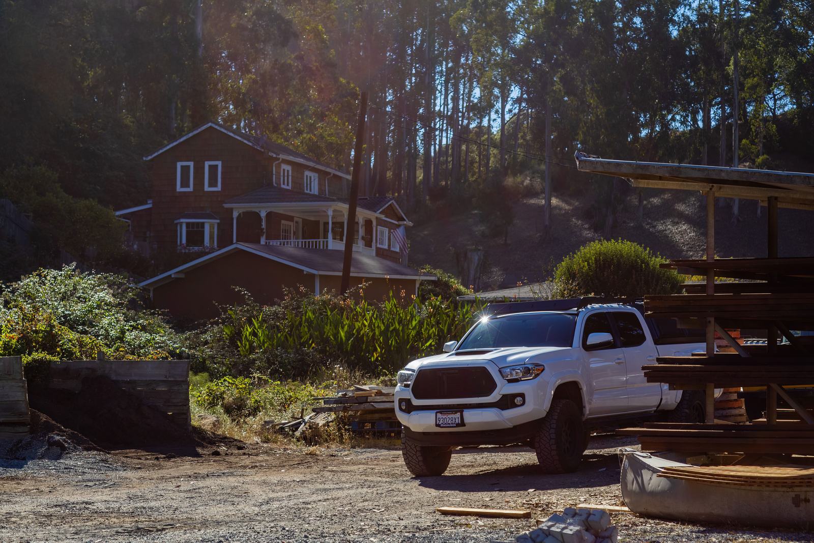 A work truck parked in a driveway in daylight, standing in for a business built on owned traffic instead of rented leads.